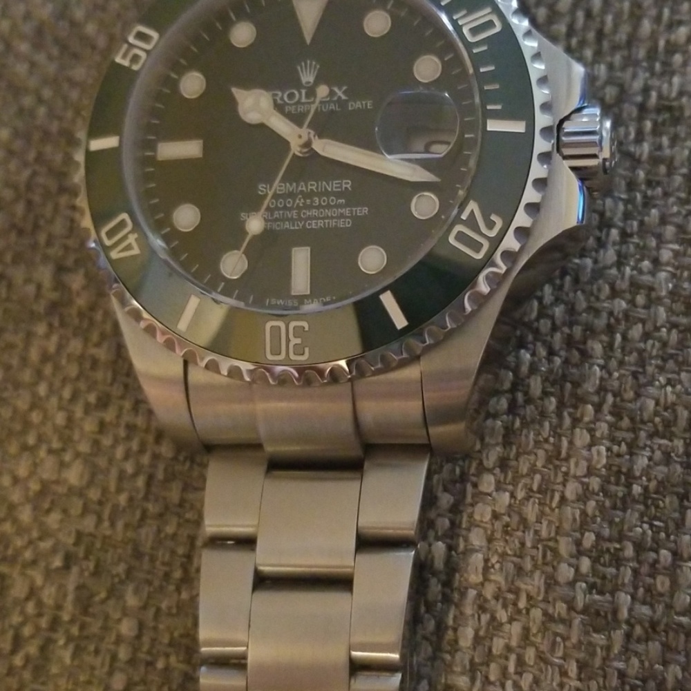 Green subamriner watch